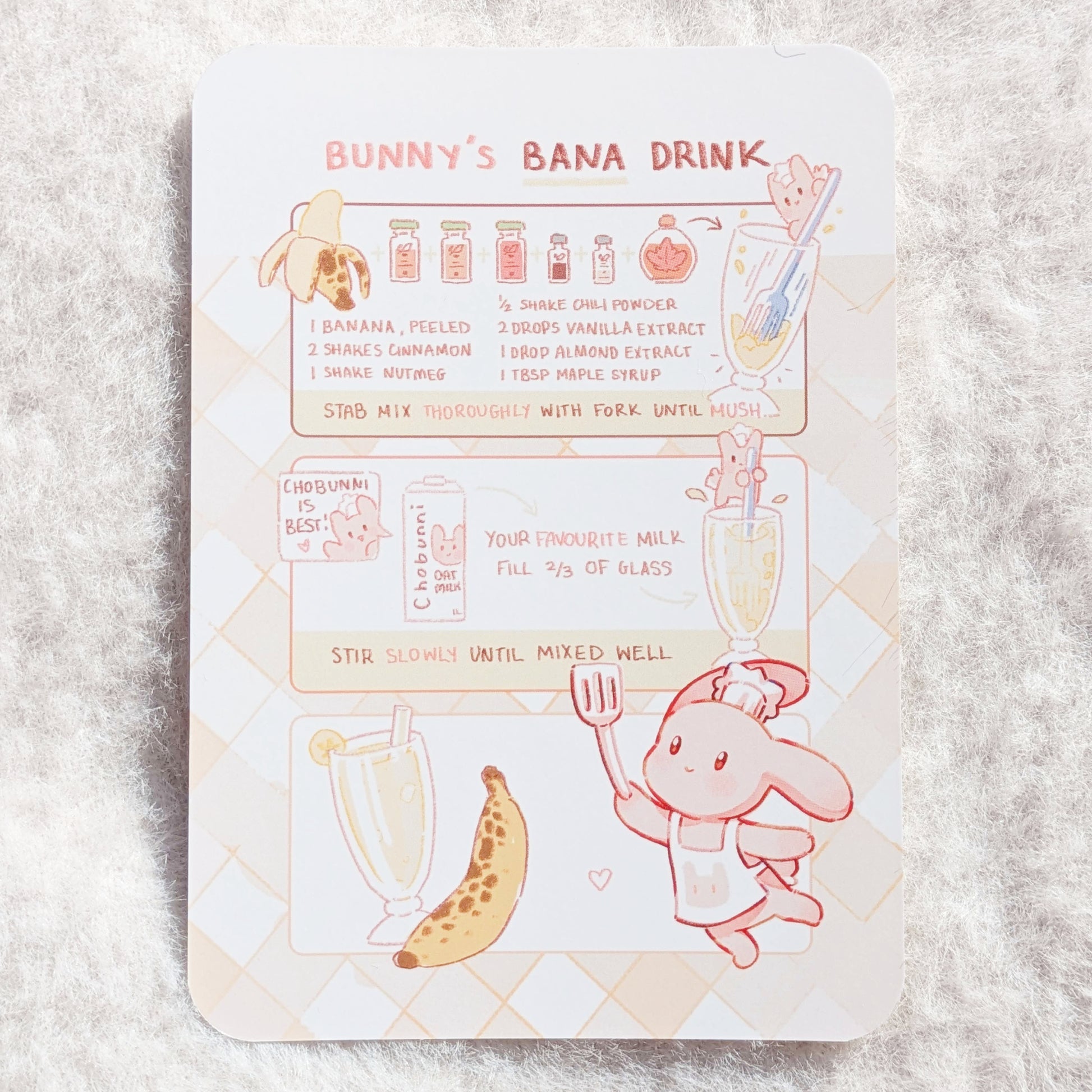 Illustrated recipe card for 'Bunny's Bana Drink' on a soft background.