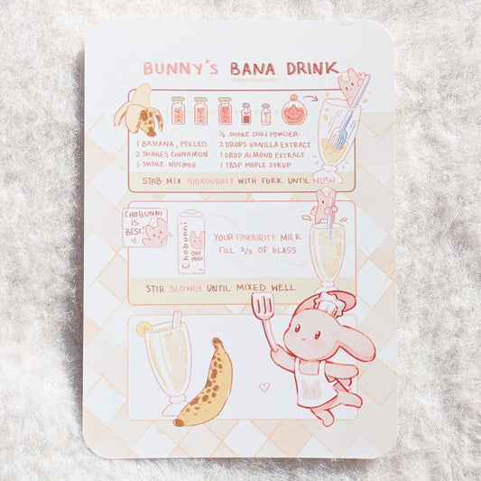 Illustrated recipe card for 'Bunny's Bana Drink' on a soft background.