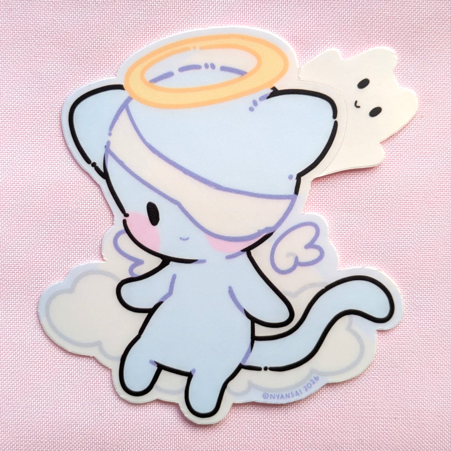 Cartoon angel cat sticker on a pink background