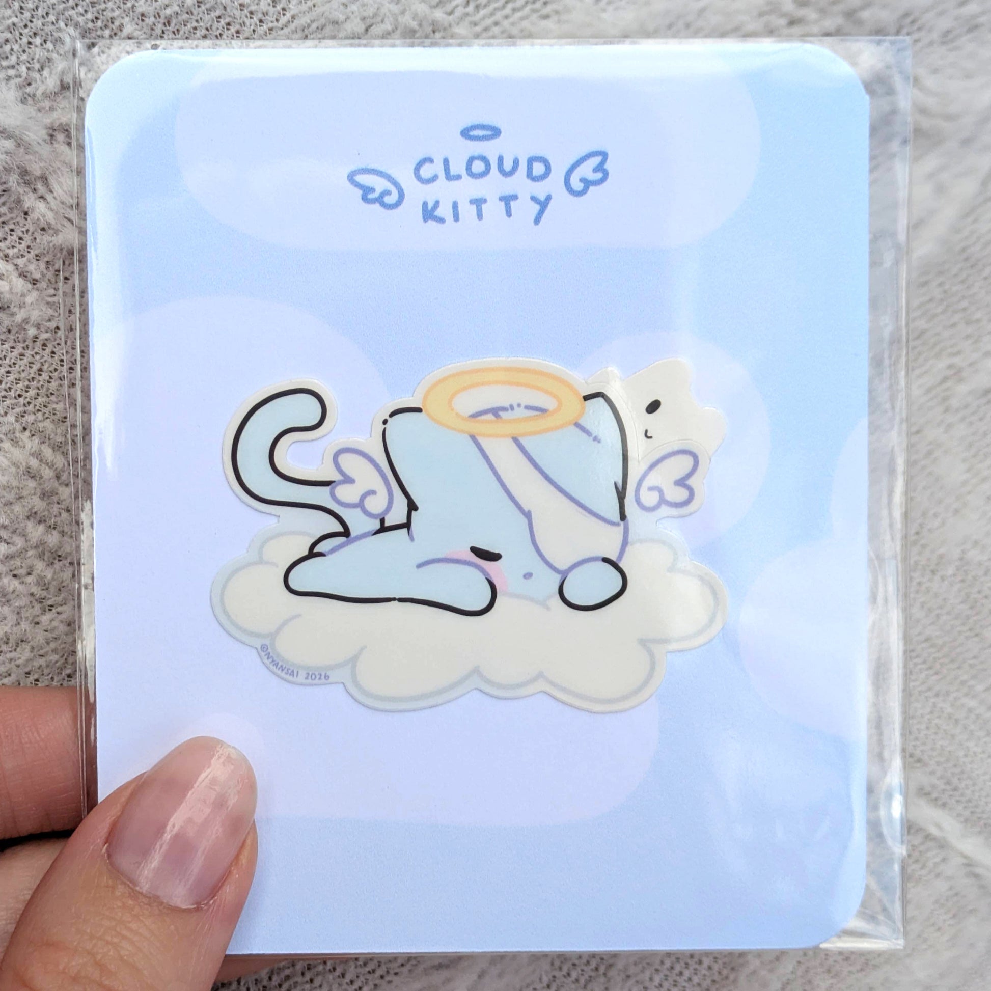 Cat sticker in clear polybag with backing card